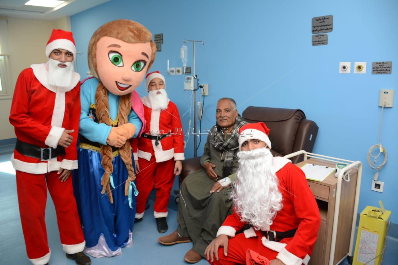 عروض ترفيهية وتوزيع هدايا "بابا نويل" علي مرضي السرطان  بالأقصر
