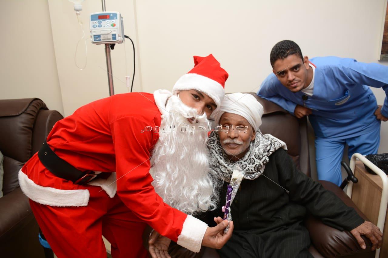 عروض ترفيهية وتوزيع هدايا "بابا نويل" علي مرضي السرطان  بالأقصر