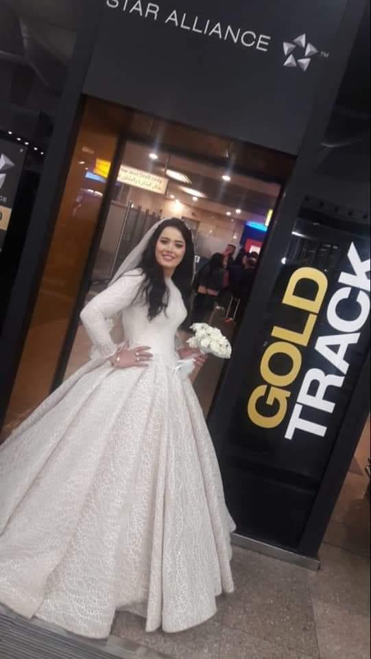 مصرللطيران تحتفي بعروسة ليلة زفافها في مطار القاهرة