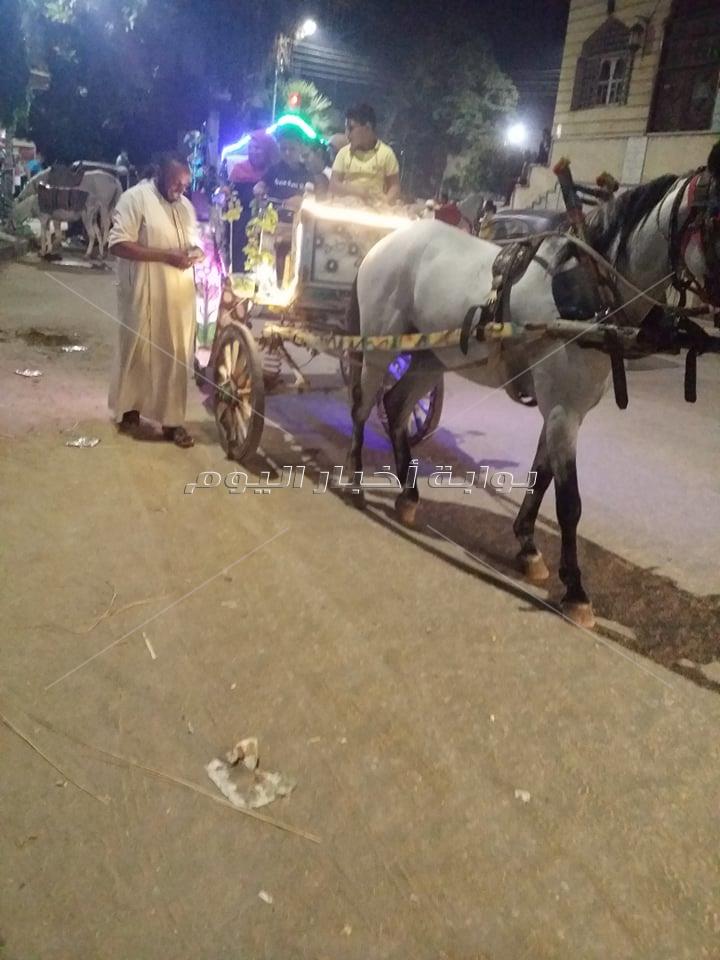 ركوب المراجيح و الخيل والدراجات أبرز مظاهر الاحتفالات بالعيد بمدن دمياط   