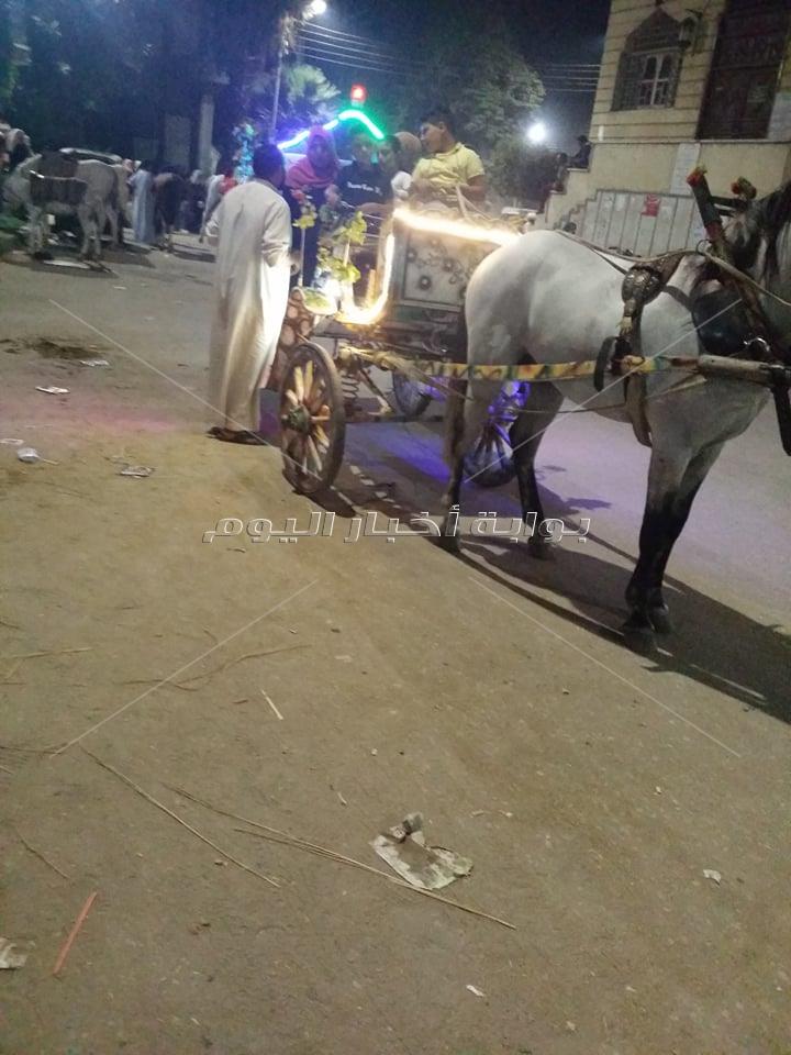 ركوب المراجيح و الخيل والدراجات أبرز مظاهر الاحتفالات بالعيد بمدن دمياط   