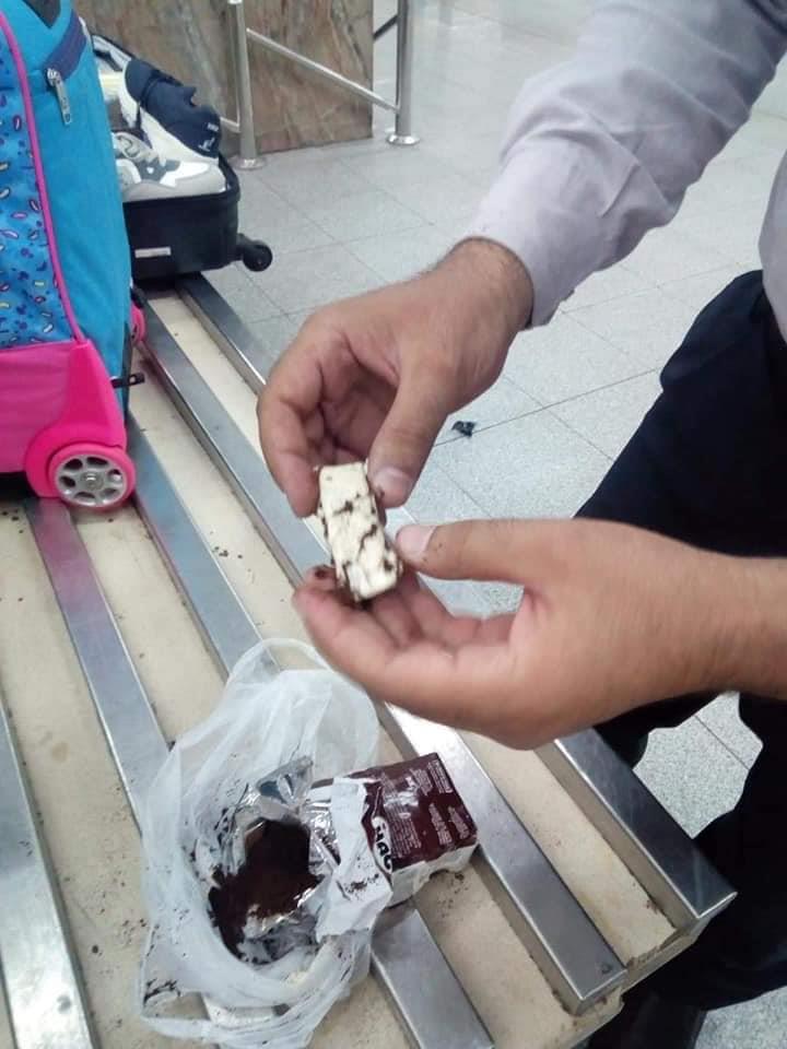 صور الشوكولاتة للتهريب الأموال الهرمونات بمطار القاهرة