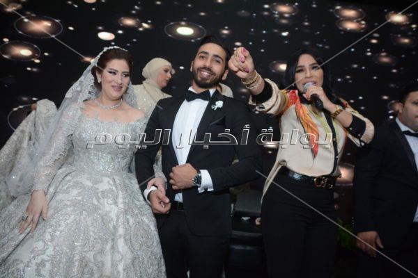 تامر حسني وفؤاد والليثي وأمينة نجوم زفاف «منصور ورغدة»