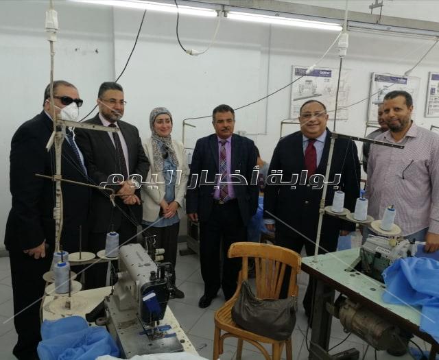 تصنيع الملابس الوقائية لأطباء مستشفيات الحجر الصحي بجامعة حلوان