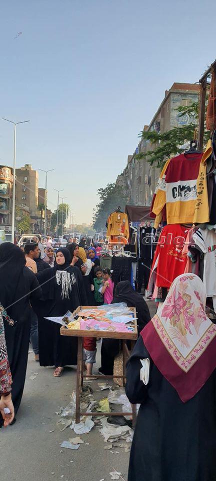 كورونا تحتفل بوعي الشعب في شوارع إمبابة ليلة العيد