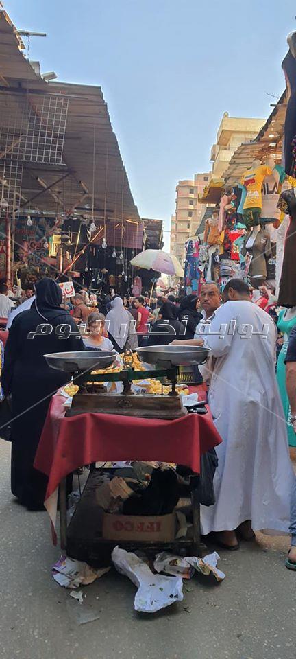 كورونا تحتفل بوعي الشعب في شوارع إمبابة ليلة العيد