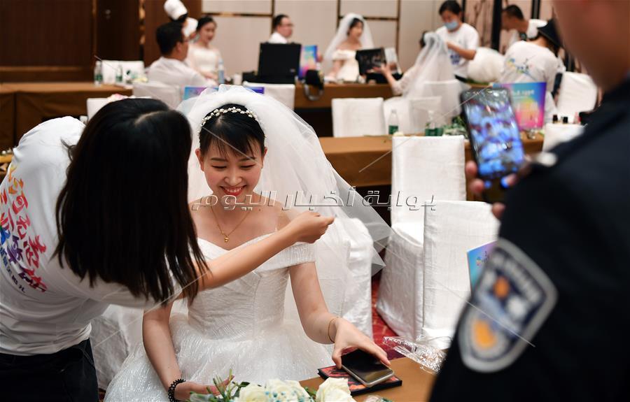 الصور| الصين تُكرم محاربي كورونا بحفل زفاف جماعي