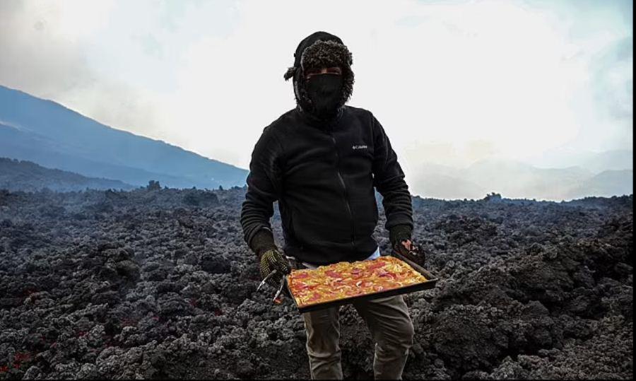 مغامر يطهو «البيتزا» على الحمم البركانية