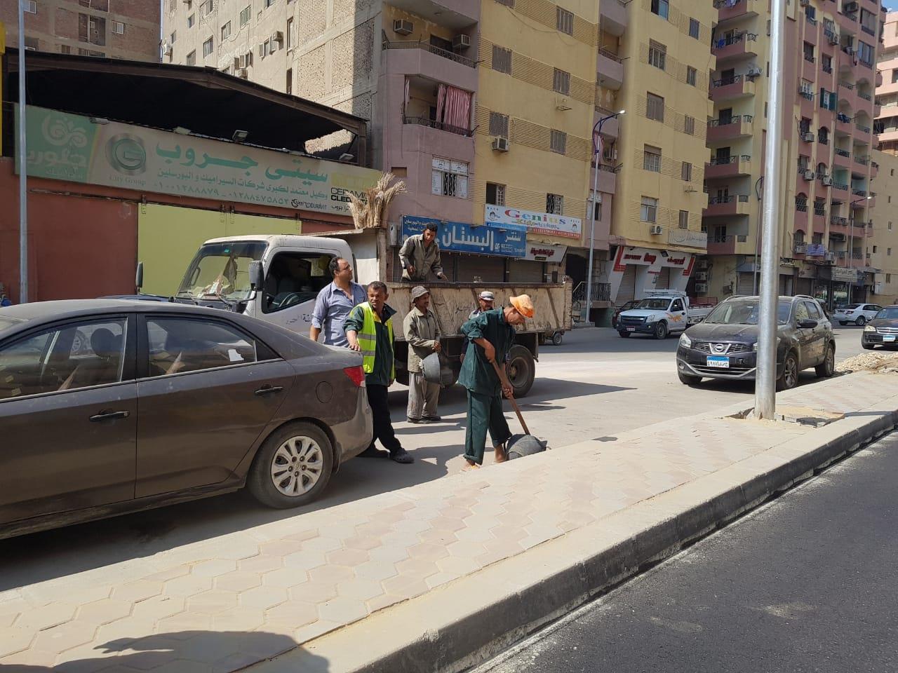 حملة نظافة وتجميل شارع الزعيم السادات في الطالبية بالجيزة