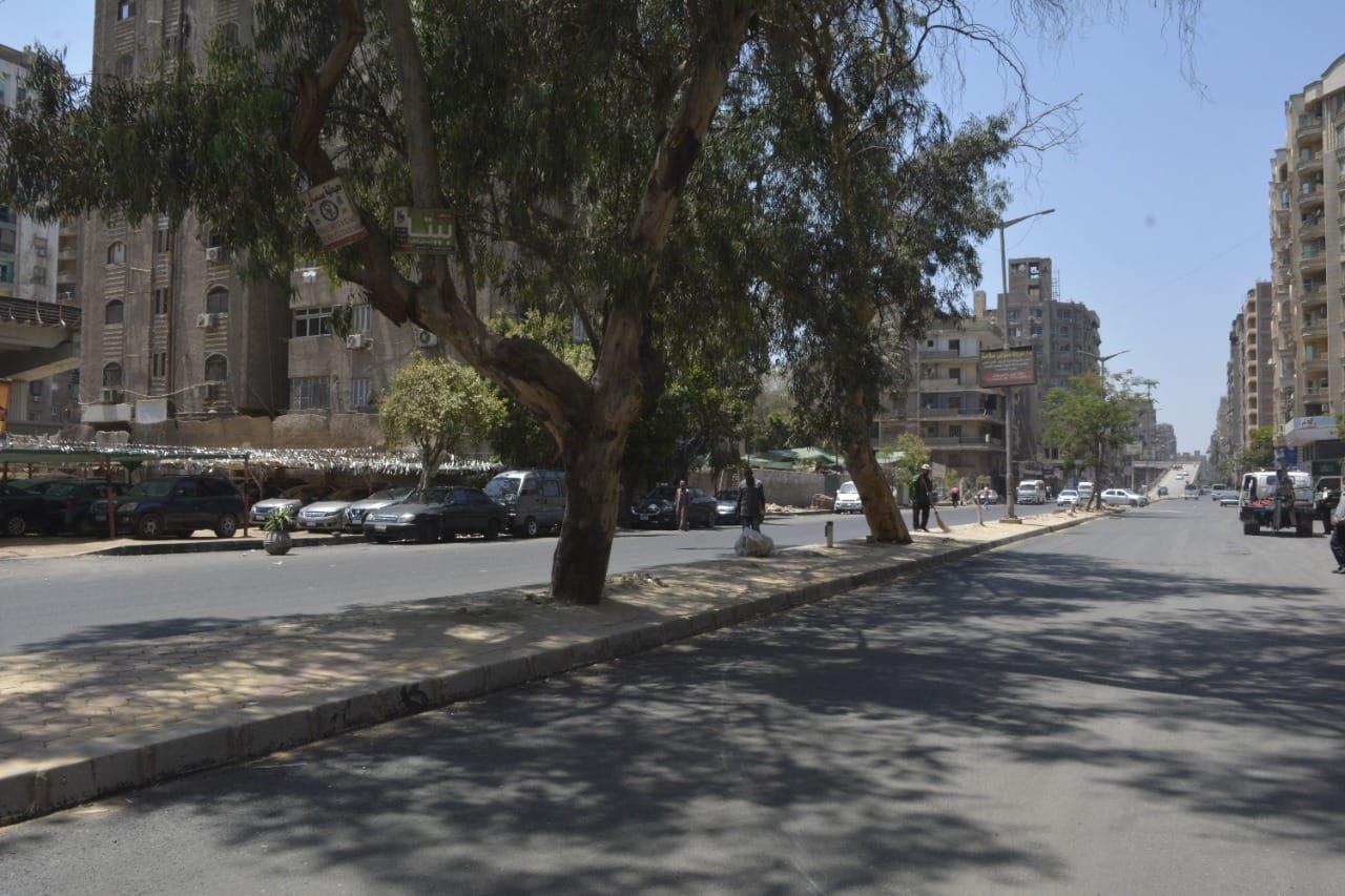 محافظ الجيزة يتابع تنفيذ طبقة الرصف السطحية بشارع السودان | صور 