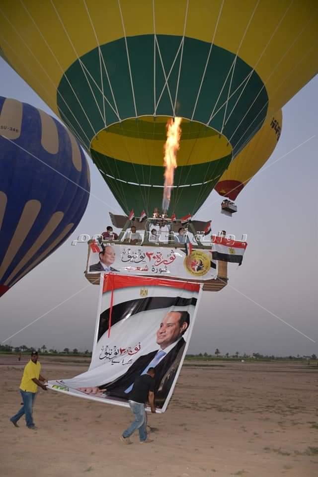15 طائرة بالون تنطلق فى سماء الاقصر تحمل الاعلام المصريه