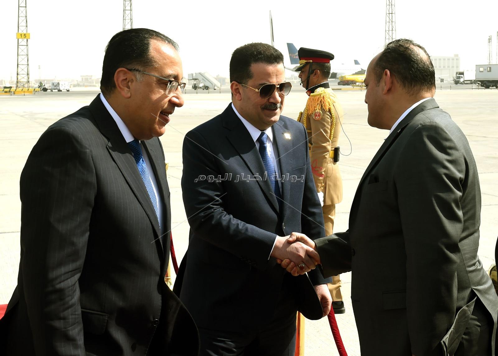 رئيس الوزراء يستقبل نظيره العراقي بمطار القاهرة