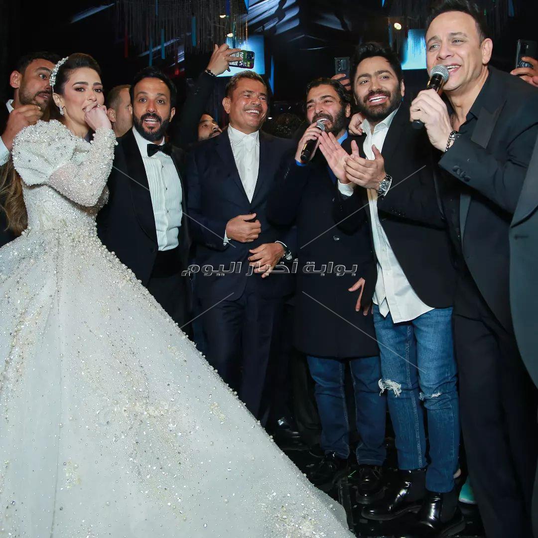 الهضبة والكينج ونجم الجيل.. 50 صورة لنجوم الغناء في زفاف أحمد عصام