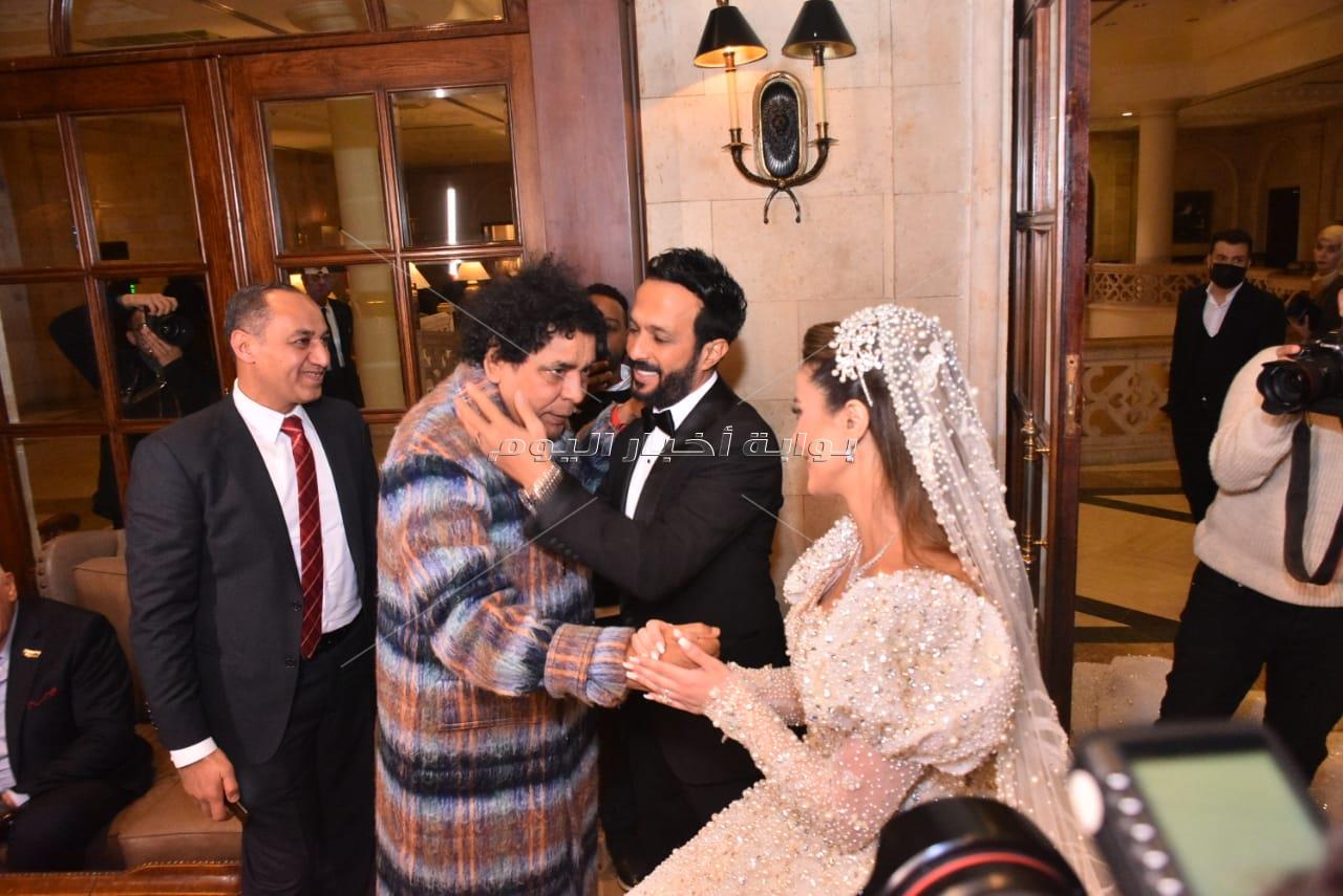 الهضبة والكينج ونجم الجيل.. 50 صورة لنجوم الغناء في زفاف أحمد عصام