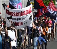 «احتجاجات وإضرابات».. العمال يحتفلون بعيدهم بتظاهرات غاضبة حول العالم