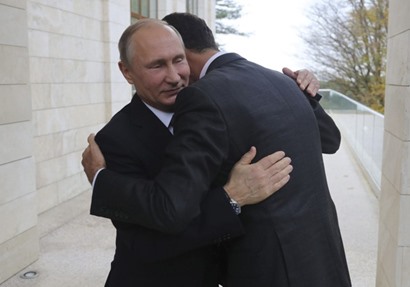 بشار الأسد ونظيرة الروسي فلاديمير بوتين في سوتشي الاثنين 20 نوفمبر - رويترز