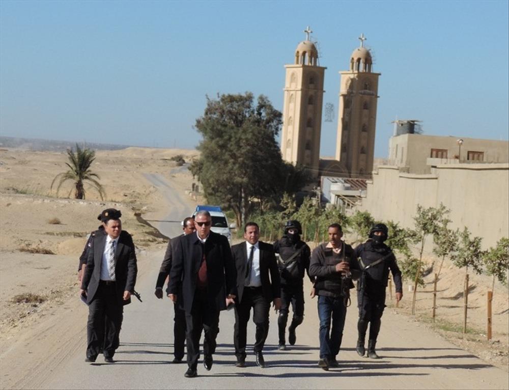اللواء خالد شلبى أثناء تفقده كنائس الفيوم