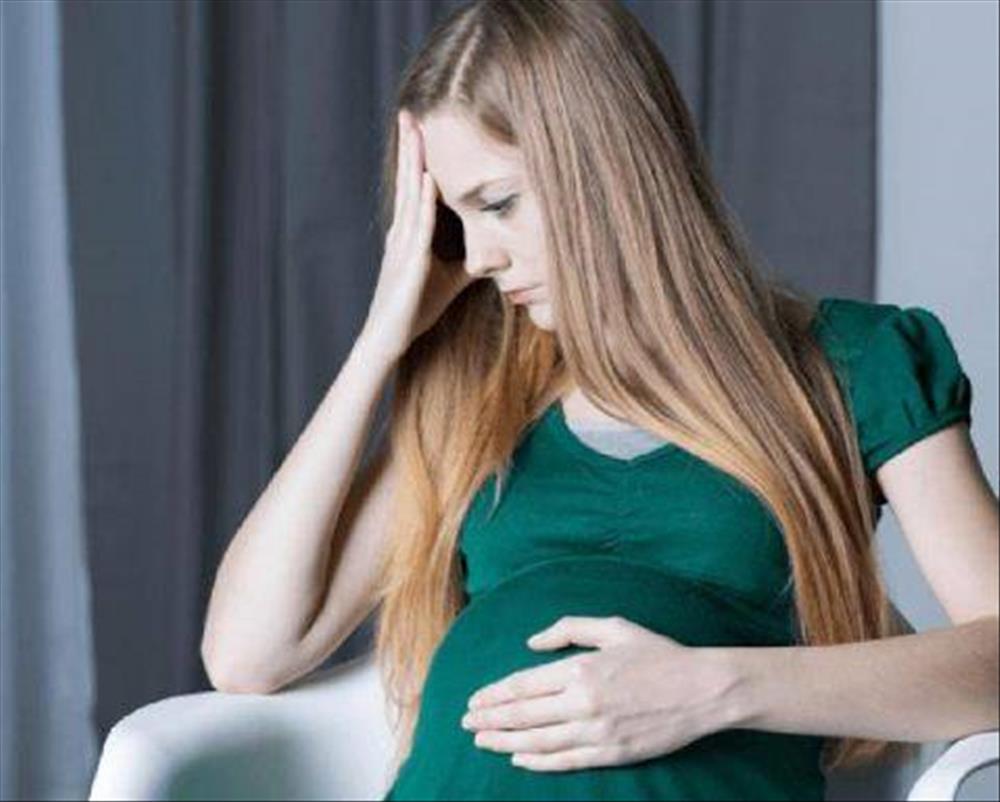 اكتئاب الحمل.. الأسباب والأعراض وطرق تجنبه