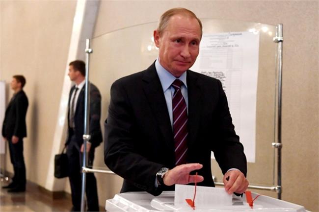 بوتين يدلي بصوته في الانتخابات