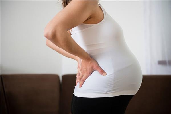 10 أسباب للالم الضهر الحامل