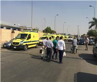سيارات الإسعاف تصل المطار استعدادًا لنقل رفات 21 مصريًا