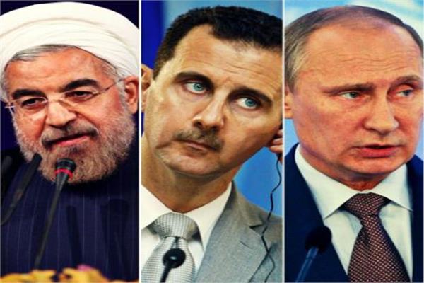 فلاديمر بوتين وبشار الأسد وحسن روحاني