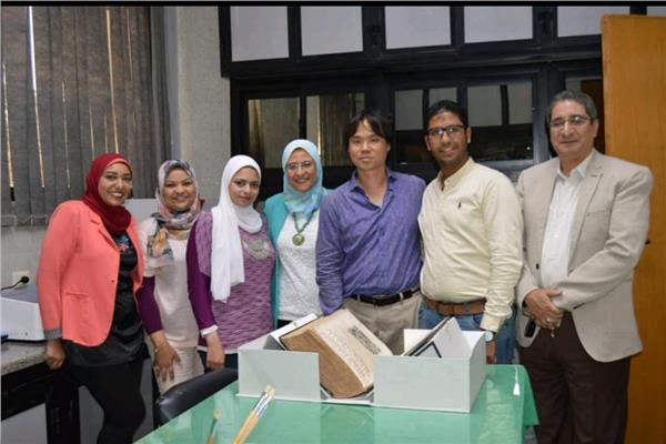 جامعة عين شمس تحتفل بانتهاء ترميم 1300 صفحة لكتاب أبو قراط في الطب