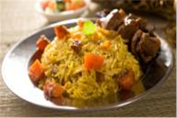 أرز بالخضروات مع لحم كباب حله