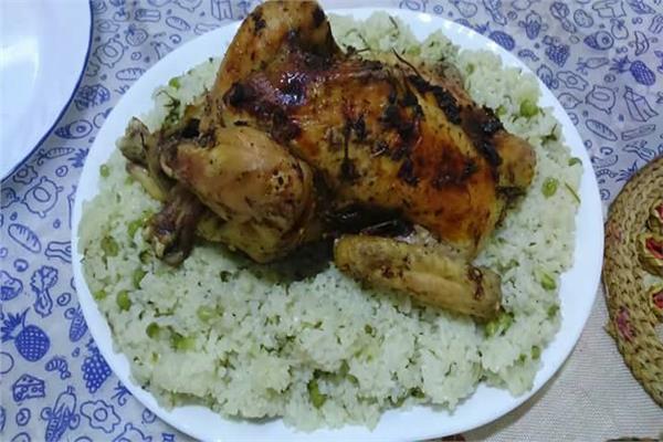 دجاج بالزعتر مع ارز بالبازلاء والبقدونس