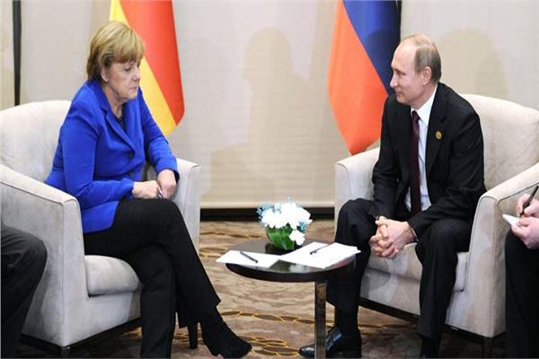  الرئيس الروسي فلاديمير بوتين والمستشارة الألمانية أنجيلا ميركل