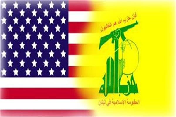 شعار حزب الله وعلم أمريكا
