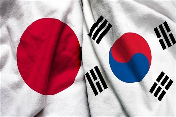 علما كوريا الجنوبية واليابان