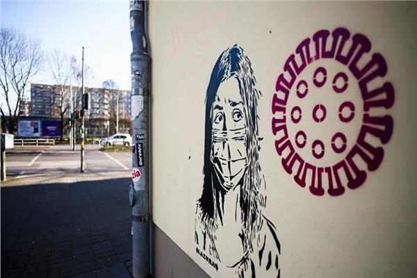 رسومات في شوارع برلين للتحذير من خطورة فيروس كورونا