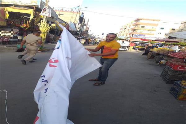  إزالة لافتات مرشحي النواب بشوارع الإسكندرية