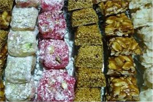 شرطة التموين تضبط 60 طن حلوى المولد فاسدة