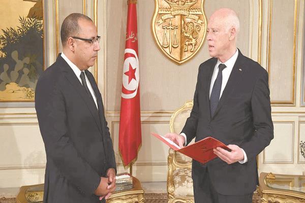 الرئيس التونسى و المشيشى فى لقاء سابق         