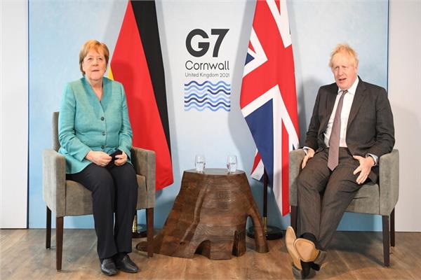 رئيس الوزراء البريطاني  والمستشارة الألمانية