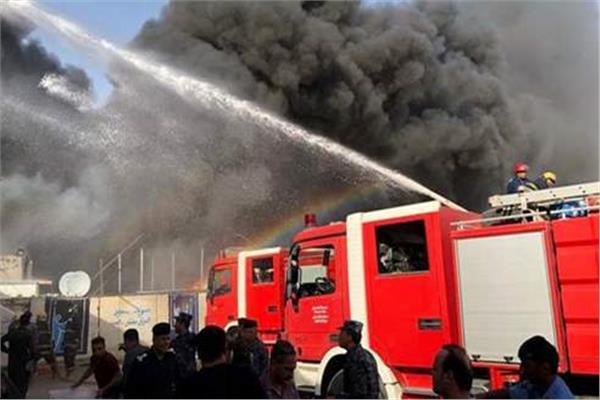 إخماد حريق بمحل شنط مدرسية في السويس