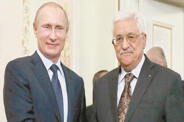 لقاء سابق بين عباس وبوتين