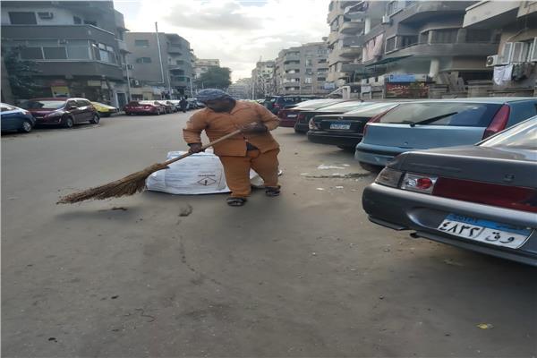حملة نظافة بشوارع حي الدقي بالجيزة 