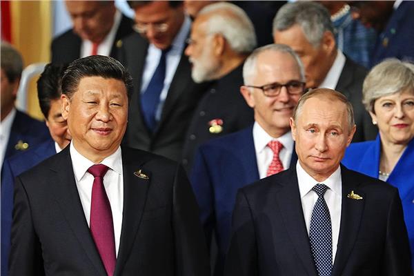 الرئيس الصيني شي جين بينج ونظيره الروسي فلاديمير بوتين