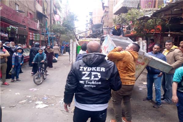  رفع 240 حالة إشغال بشوارع «المنيرة الغربية»