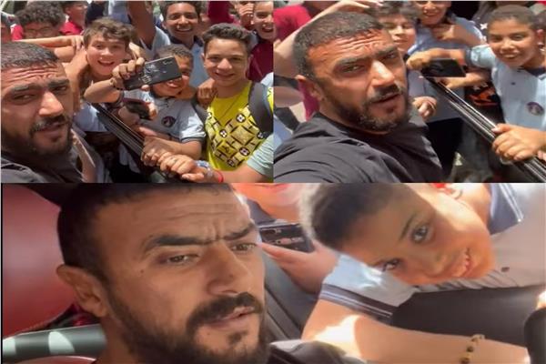 احمد العوضي يتوسط أطفال منطقته في عين شمس