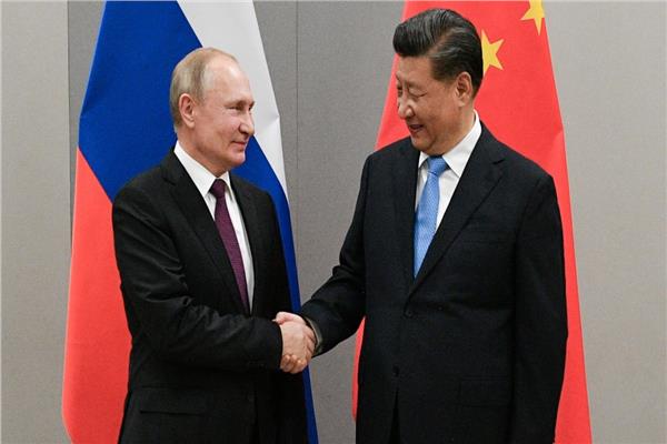 الرئيس الصيني شي جين بينج ونظيره الروسي فلاديمير بوتين