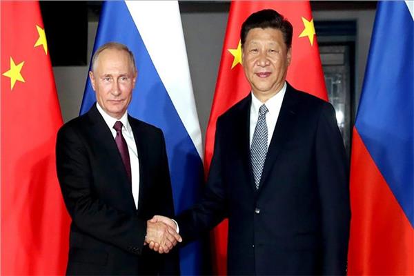 الرئيس الصيني شي جين بينج ونظيره الروسي فلاديمير بوتين