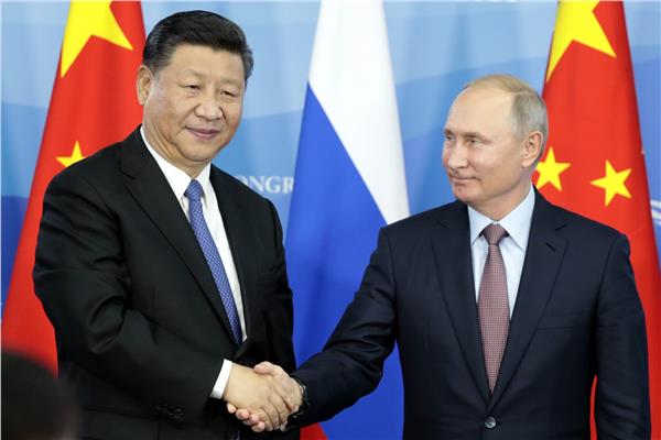 بوتين، و الرئيس الصيني شي جين بينج