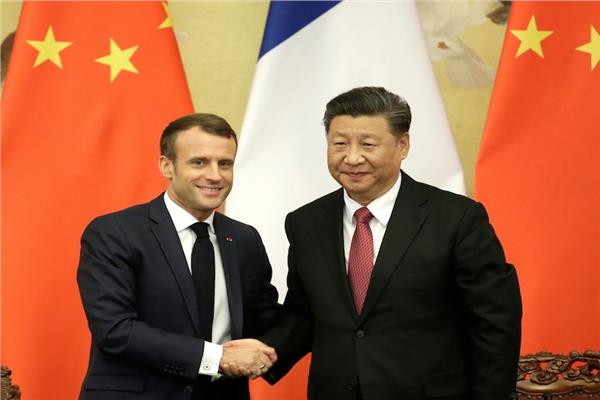 رئيس الصين والرئيس الفرنسي إيمانويل ماكرون
