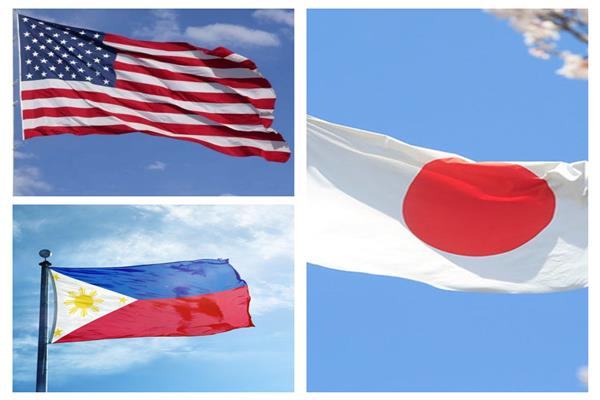 أعلام أمريكا واليابان والفلبين - أرشيفية