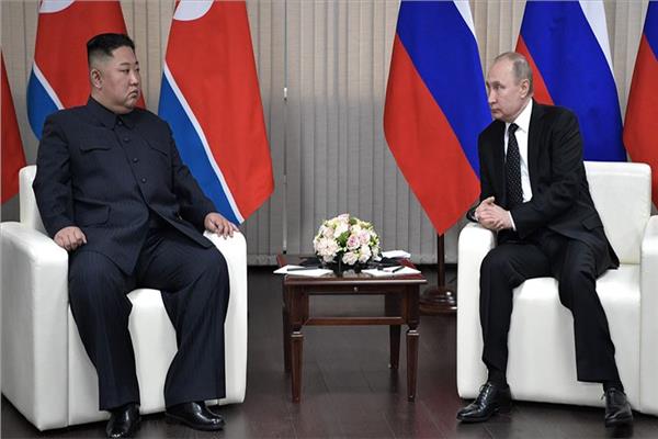 الرئيس الروسي فلاديمير بوتين ونظيره الكروي شمالي كيم جونج أون