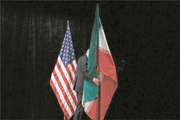 العلمان الأمريكى والإيرانى
